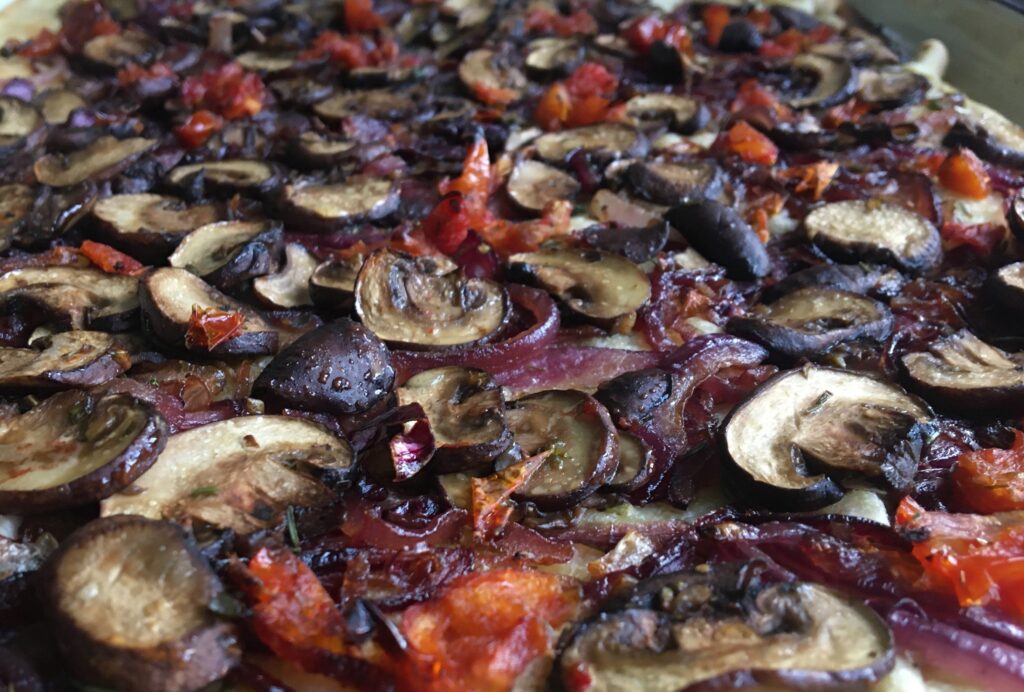 Red onion and mushroom pizza